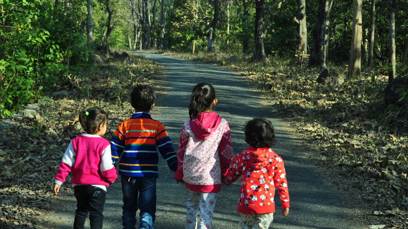 kids walking on a small road - The Golden tusk