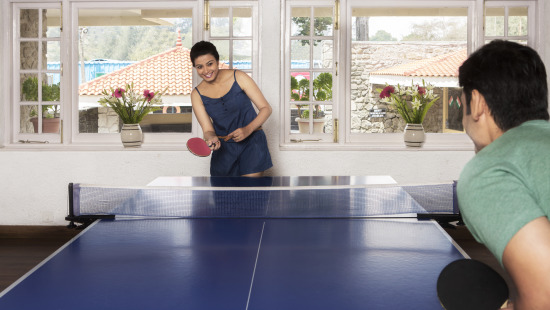 people playing table tennis