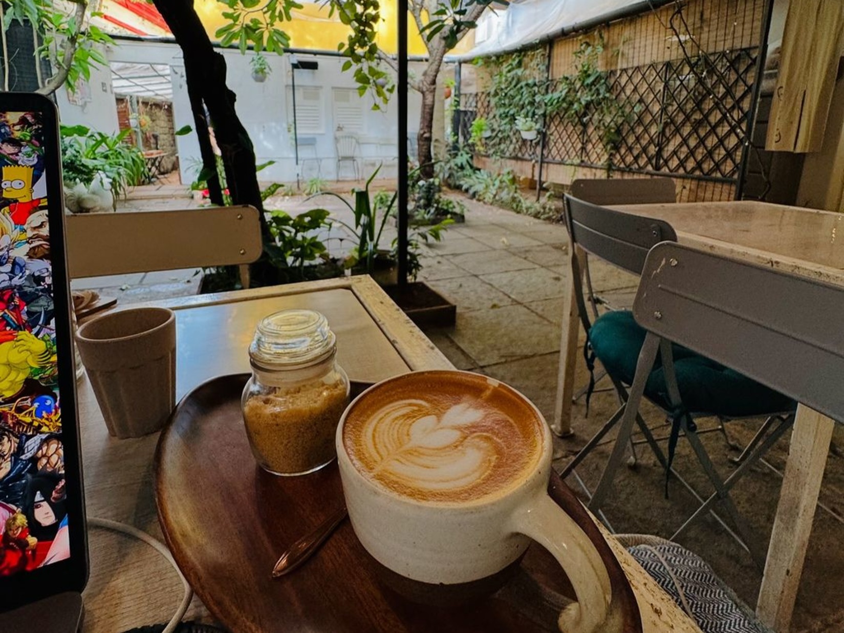 Cappuccino with brown sugar served on the table at Mo’s Café