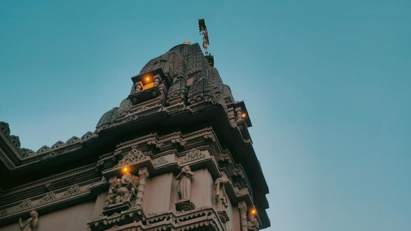 Side view of a temple with intricate carvings 