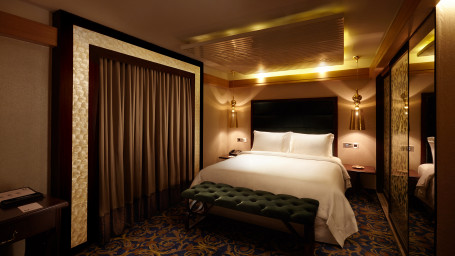 Magnificent interior view featuring mellow lighting and modern decor of hablis suite at our hotel in chennai