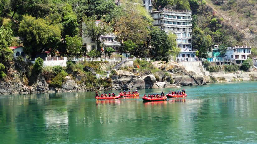 a group of people enjoying river rafting