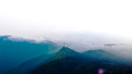 An aerial view of dolphins nose viewpoint with mist covering the background