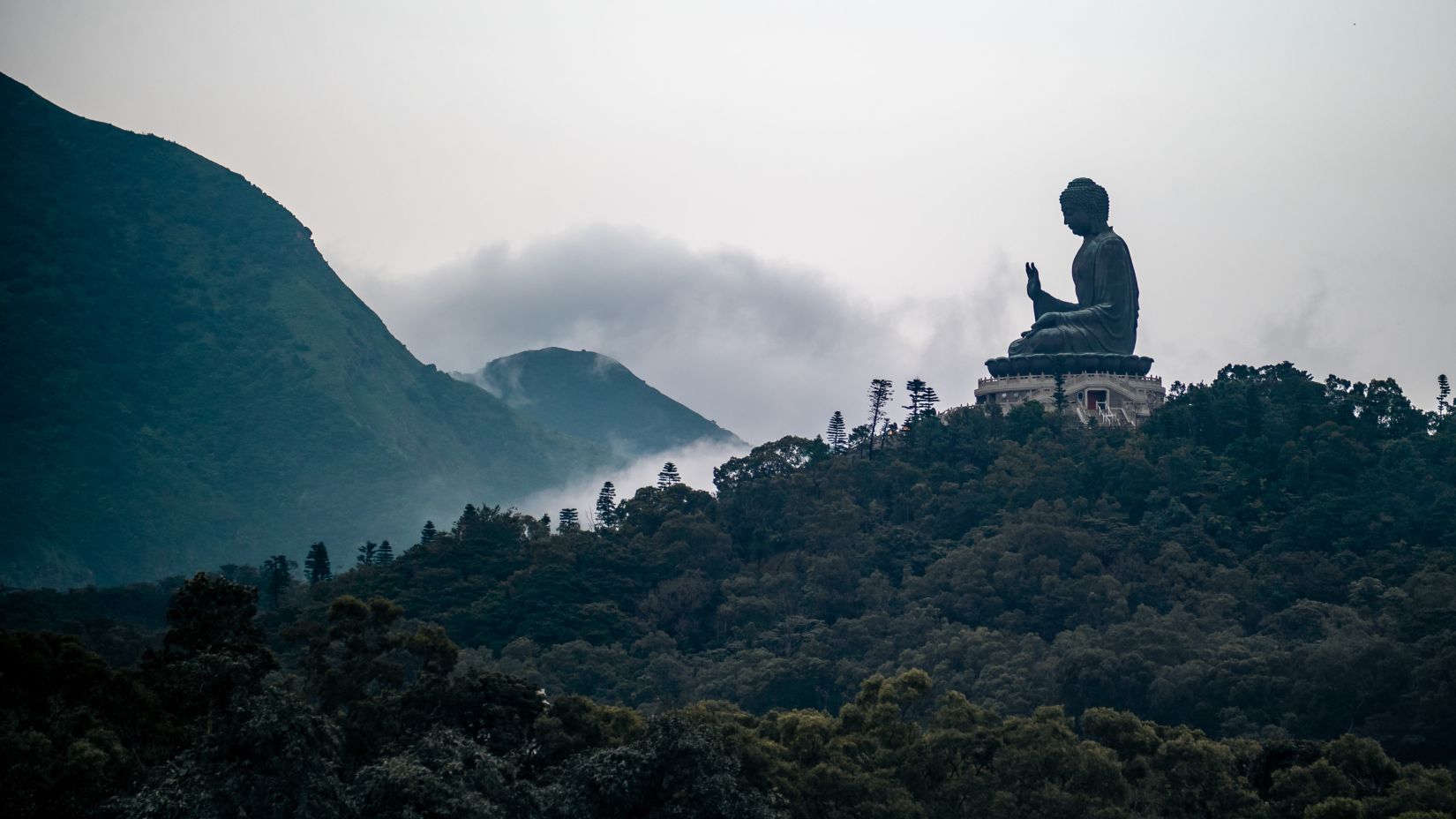 statue atop a hill