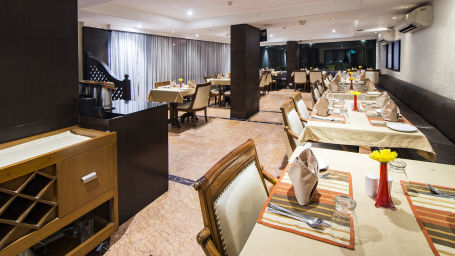 interior of our in-house restaurant in vile parle - royal palate