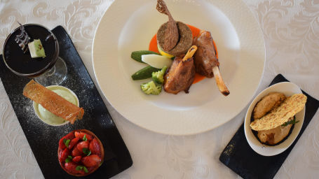 Buena Vista Luxury Garden Spa Resort - an overhead shot of a table full with three plates of food