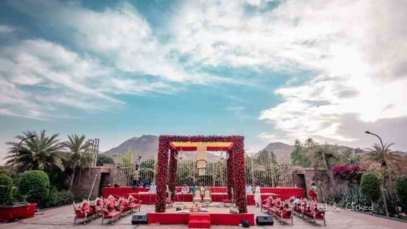 a setting for pheras with hills in the background- The Ananta Udaipur