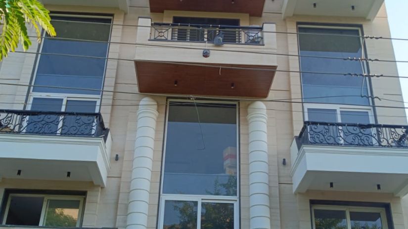 Udman by Ferns N Petals Gurgaon - facade of a building with balconies shot from a lower angle