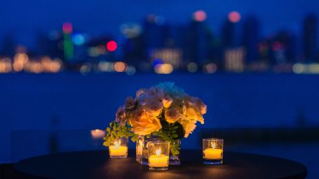 a table set up for a romantic candlelight meal