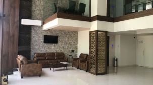 Hotel lobby with a sofa set | Kyriad Hotels, Solapur
