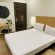 Image of a double bed at Sanctum Suites Richmond Road Bangalore