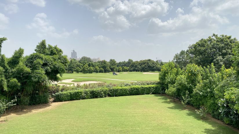 The lush green lawn at Karma Lakelands - Babymoon Near Delhi