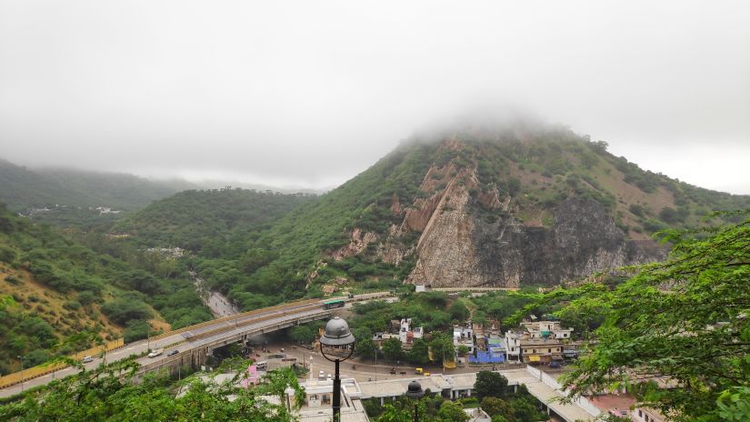 A hill beneath a cloudy sky