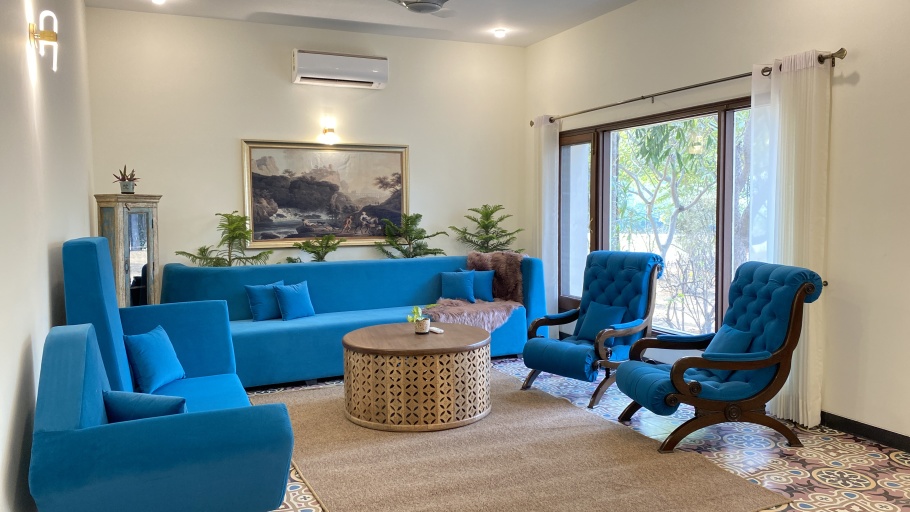 bright blue sofas in the living room of Villa 24 - 3