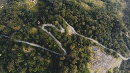 an overhead image of a winding road