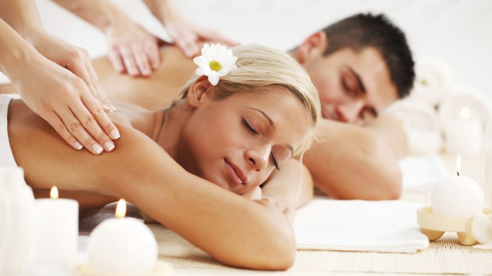 a couple getting a massage at hablis spa