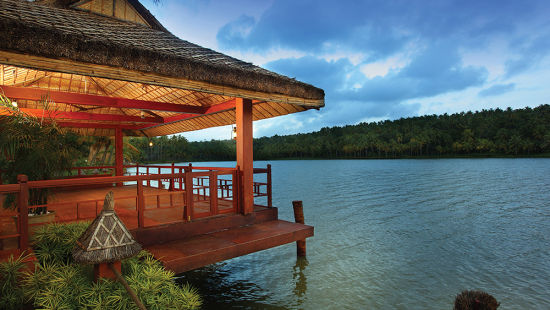 A beautiful gazebo made on the top of a lake near hotel Fragrant Nature Kollam Boat Jetty