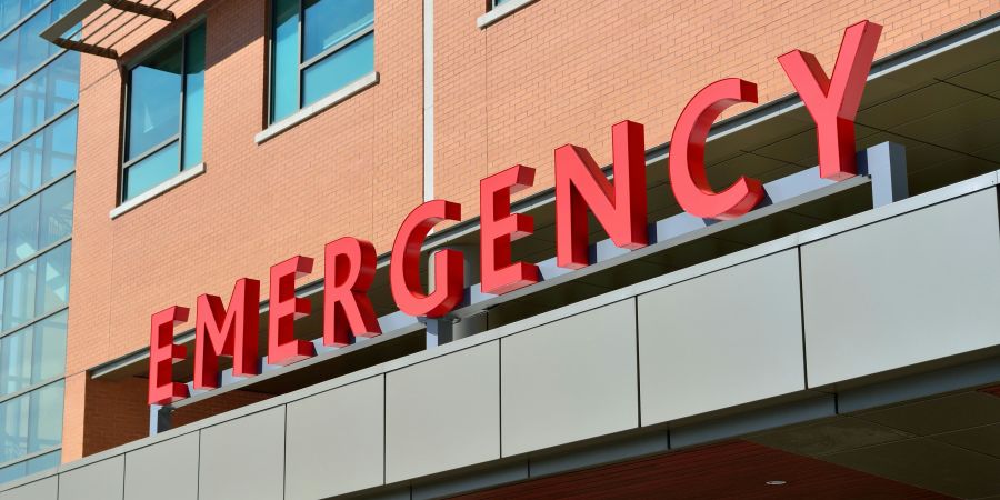 alt-text A photo showing the Red Signage reading Emergency at a hospital