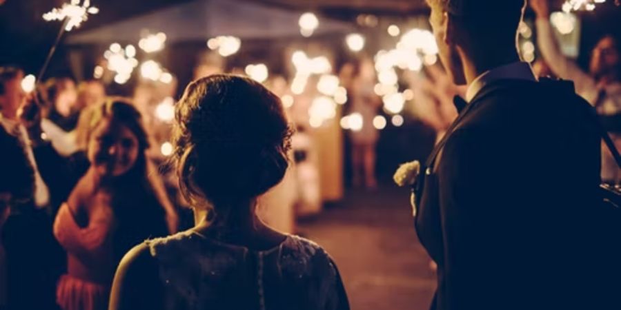 alt-text silhouette of a couple during a function