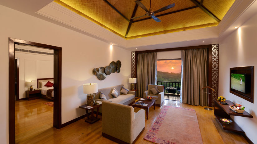 The living room area with sofa and coffee table in the executive suite - The Ananta Udaipur