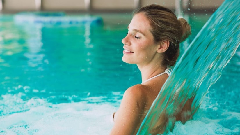 a woman bathing in a pool