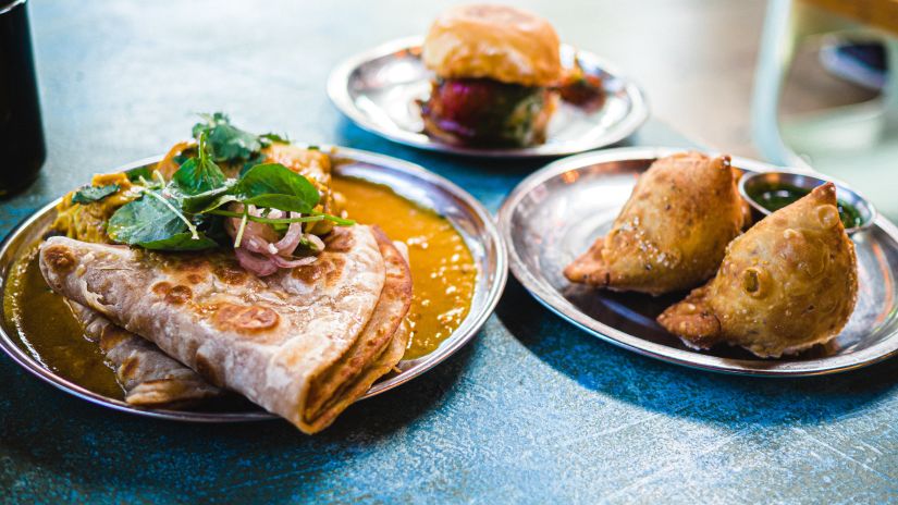 Indian food served in plates on a table