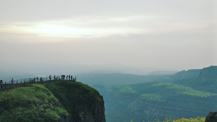 people on top of a hill