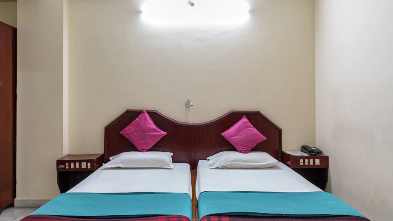 Front view of Standard double room with large bed - Hotel Ram International,  Pondicherry