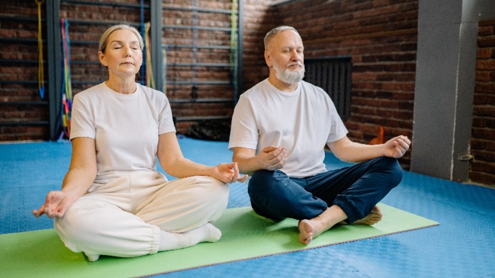 an old couple meditating at YO1 Longevity Health Resorts Catskills