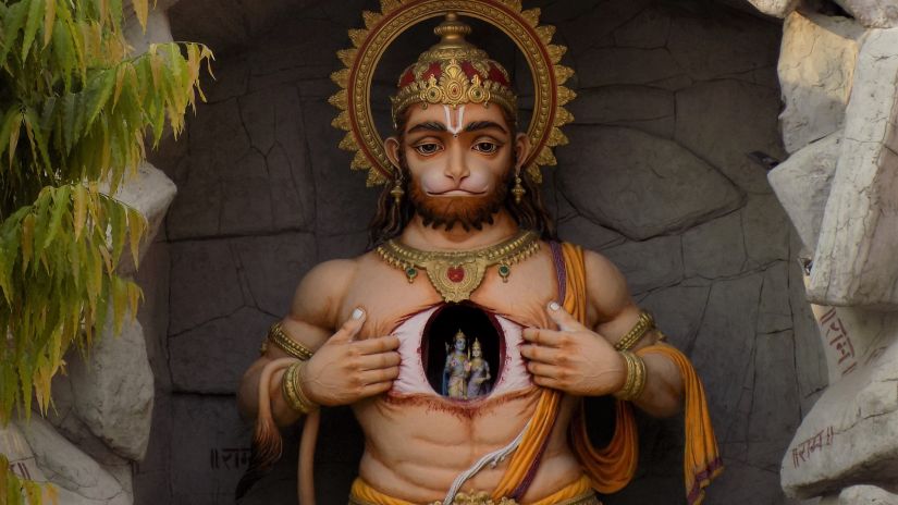 A statue of Hanuman showing his love for Ram and Sita