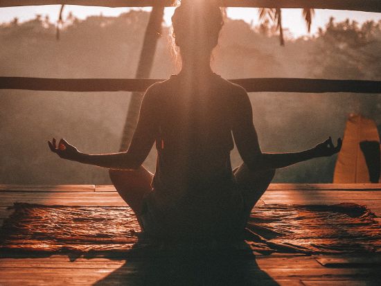 A person meditating 