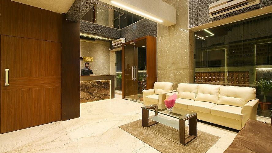  Lobby room with comfortable sofa and table at Mumbai House Luxury  Apartment, Mumbai