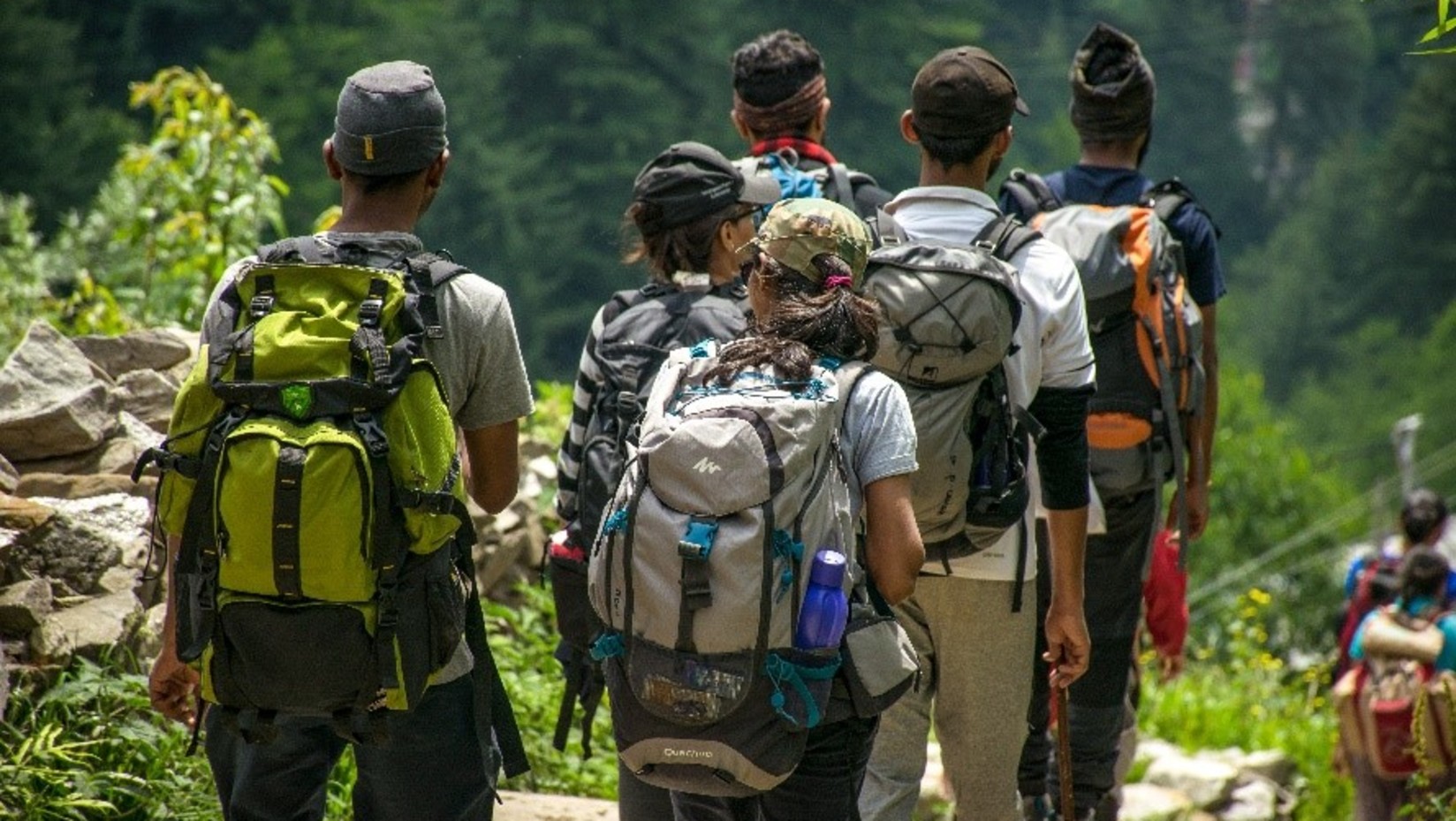 a group of people trekking together