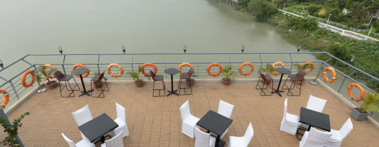 an aerial view of the seating area at the outside deck  - Polo Floatel Kolkata