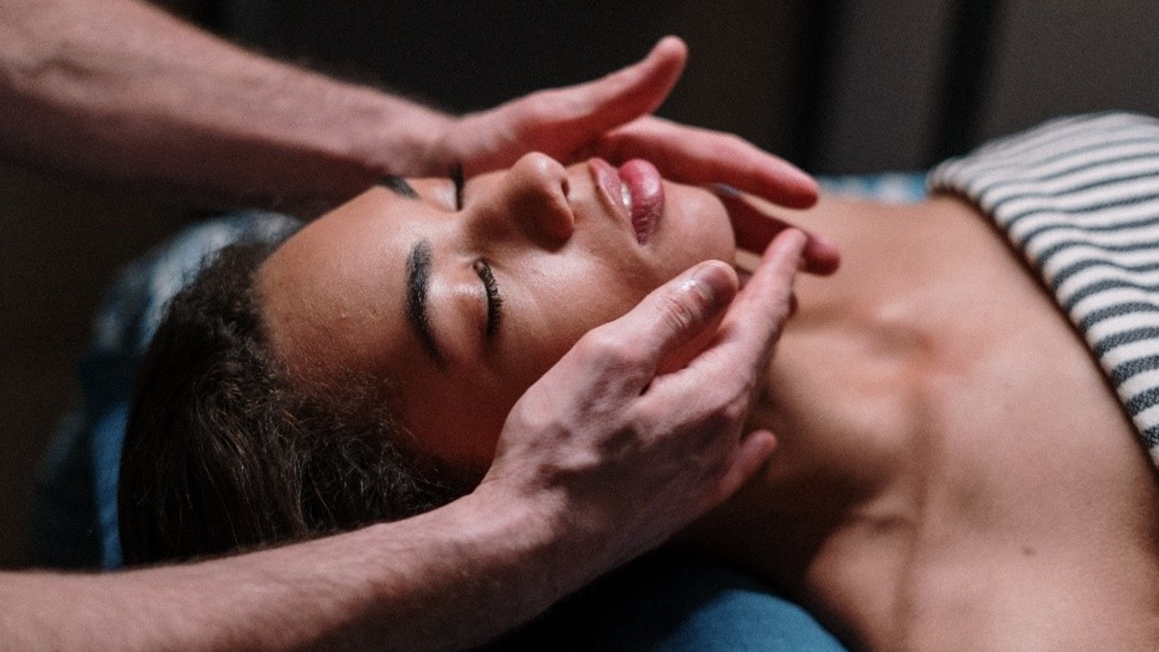 A woman resting while undergoing Ayurvedic treatment