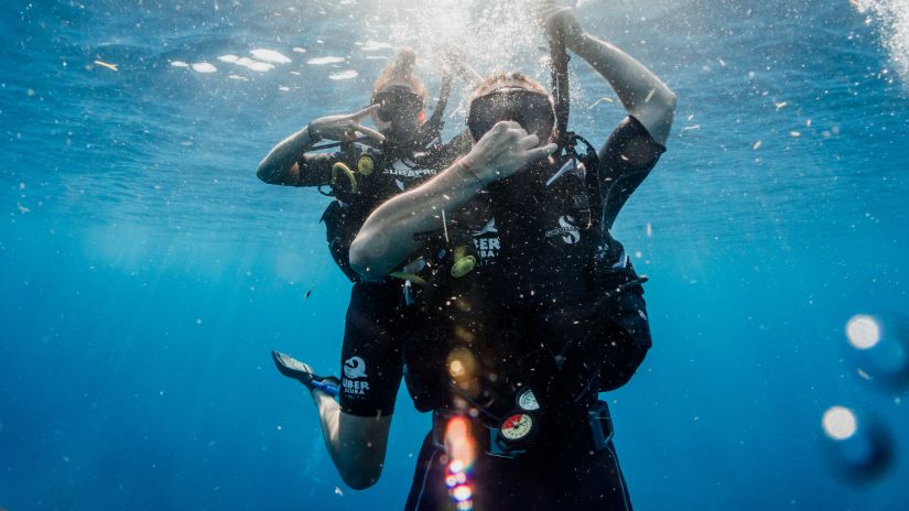 Couple scuba diving