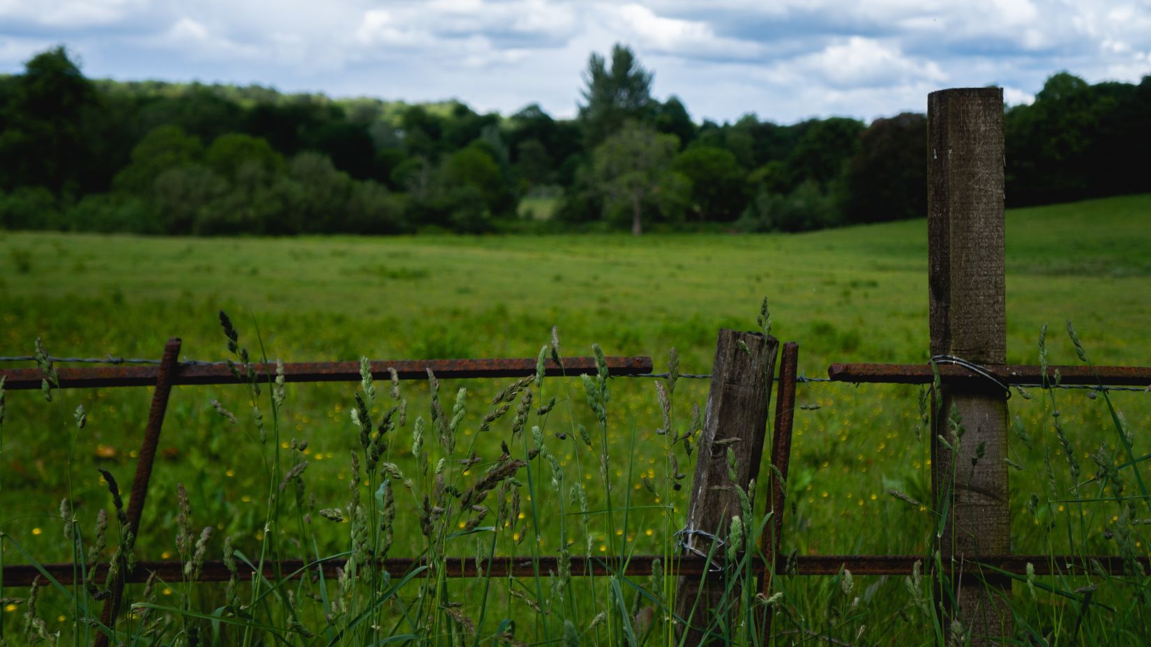 a wooden fence around a field