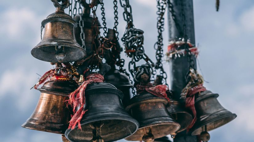 Temple bells that are hung on a pole