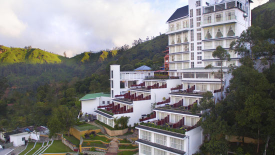 An aerial view of the grand facade of Fragrant Nature Munnar