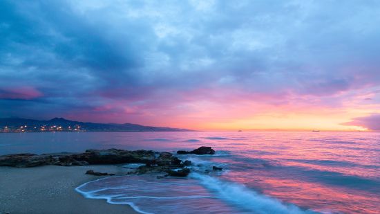 Beach with colourful sky 