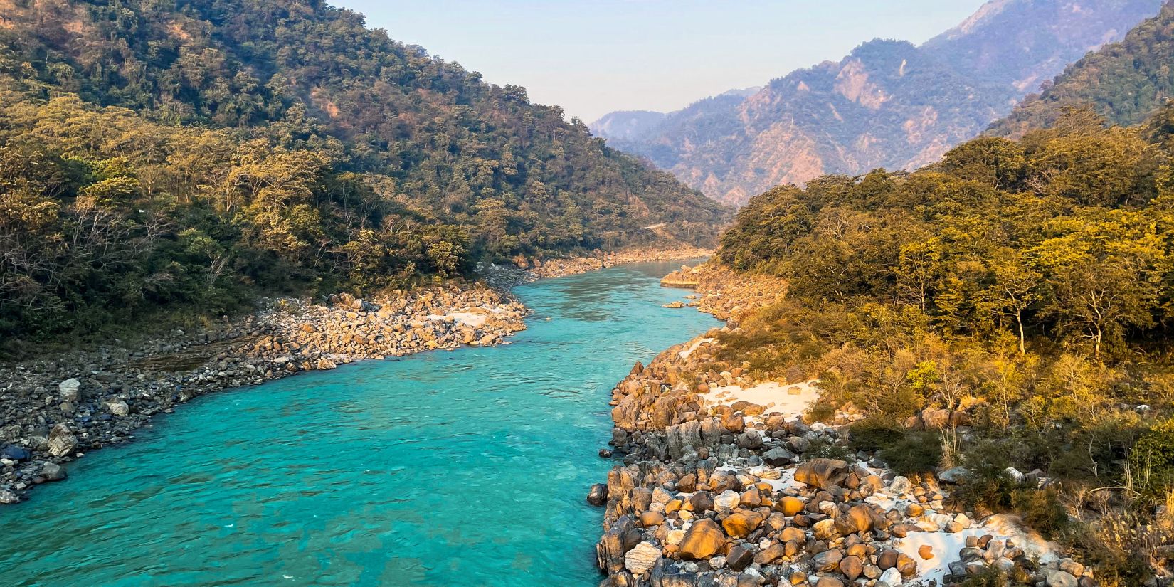 The holy river Ganga flowing in between the hills