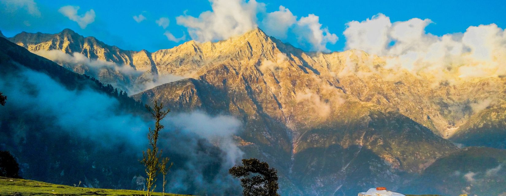 white clouds reflecting on blue water  @ Lamrin Norwood Green, Palampur