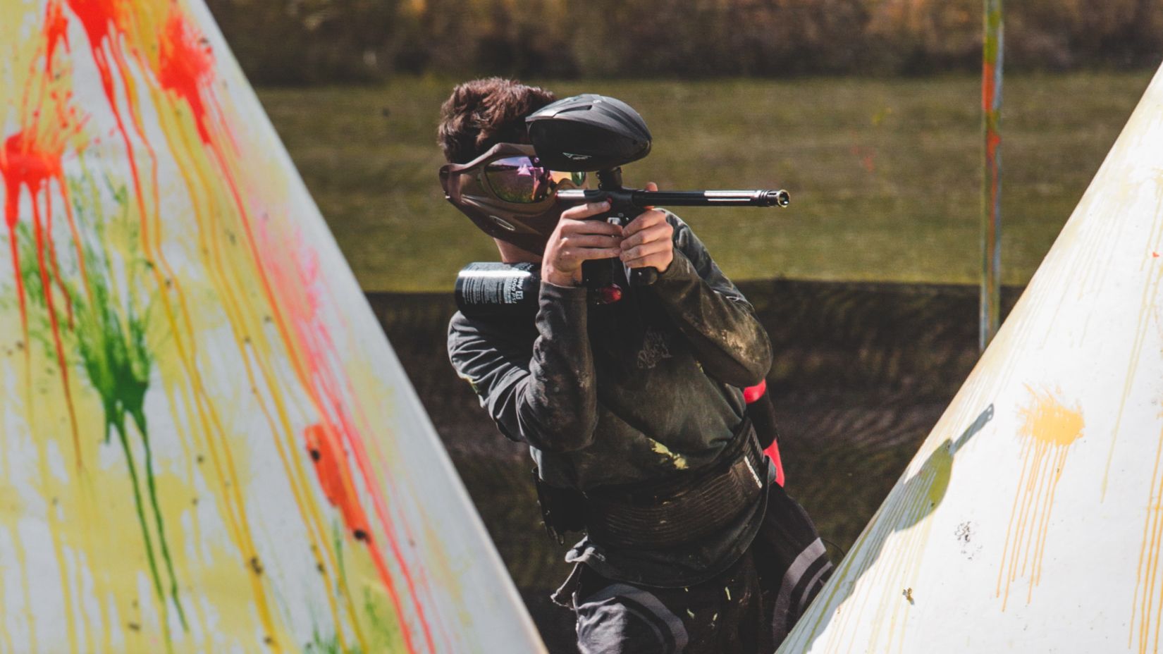 A person participating in paint ball