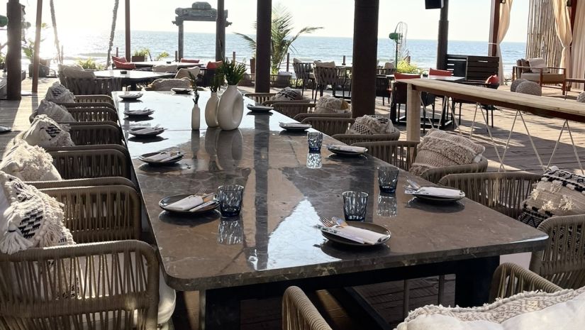 Beach resturant with tiled tables