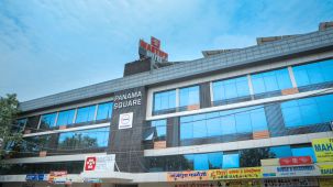 facade of a hotel building with blue sky as the  backdrop - Mastiff Hotel, Ankleshwar