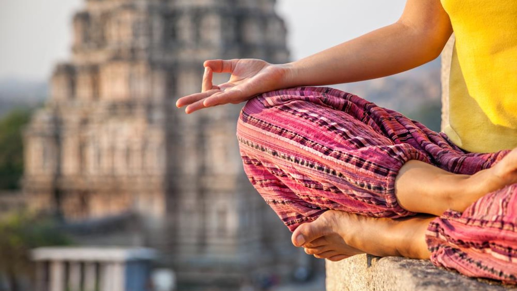 a woman practising a yoga pose