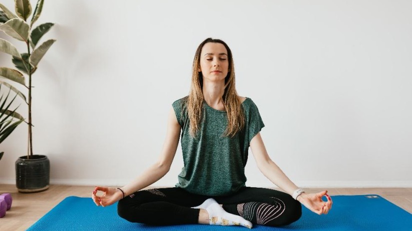 a person performing Yoga