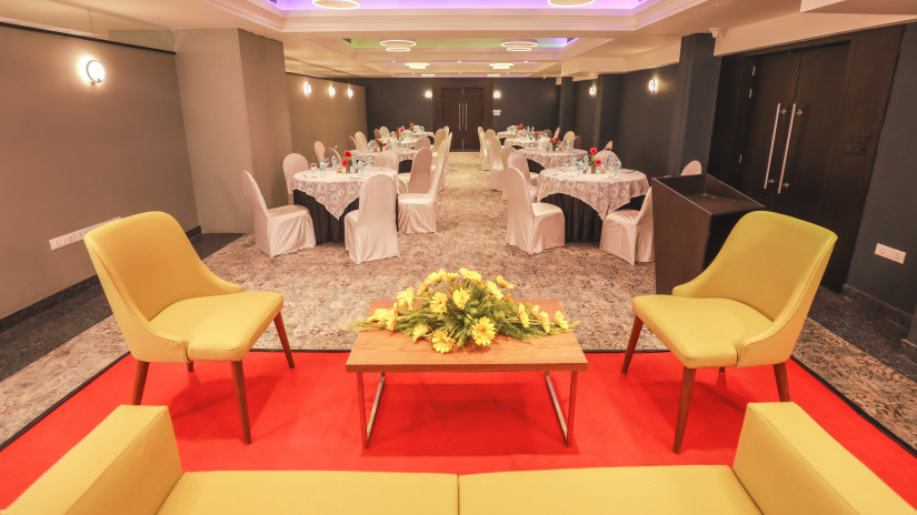 hotels with banquet halls in Bhubneshwar with yellow chairs