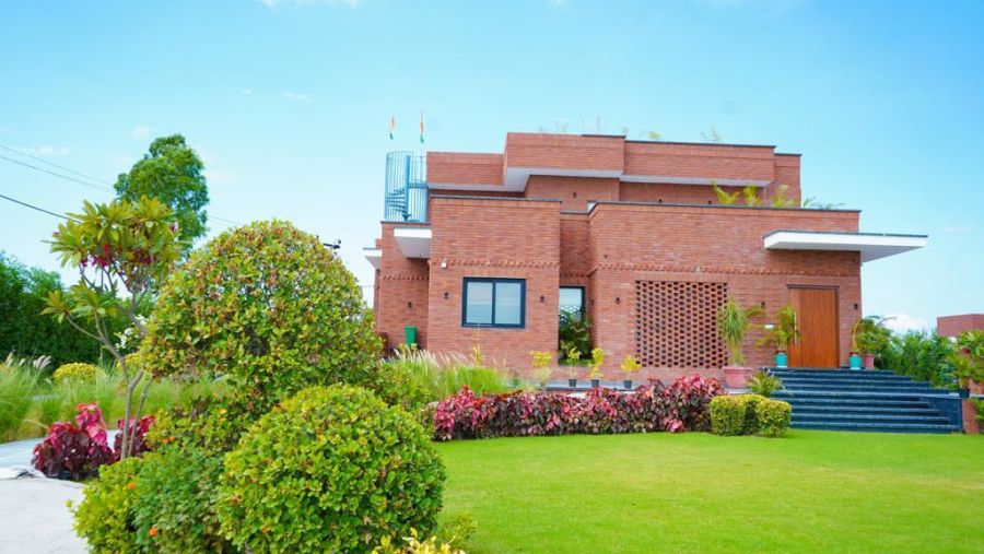 Overview of Themis Farm House, Panipat with a Garden in view