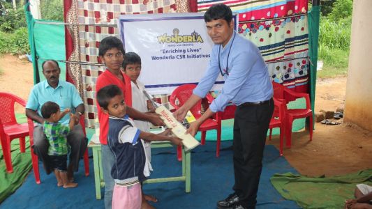 Gifting cricket bat to children